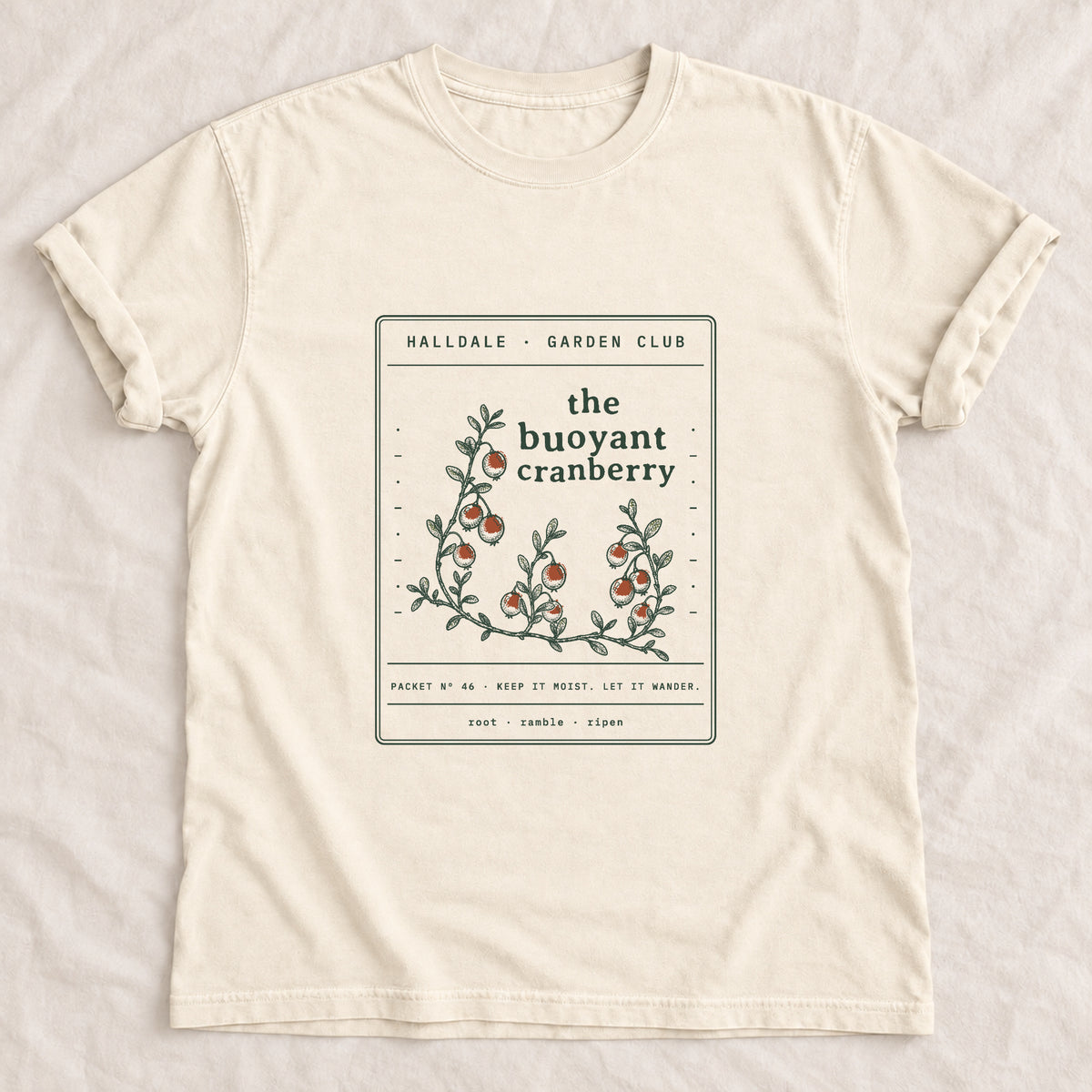 The Buoyant Cranberry tee in Ivory, laid flat
