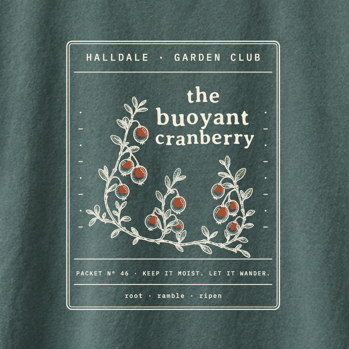 The Buoyant Cranberry tee in Blue Spruce, close-up of the print