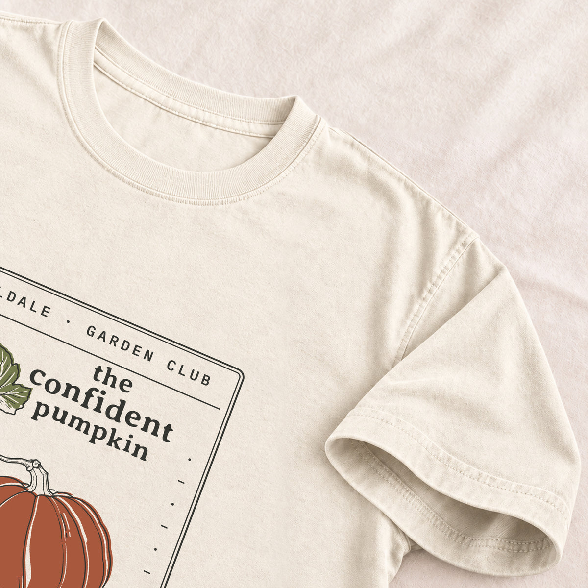 The Confident Pumpkin tee in Ivory, detail