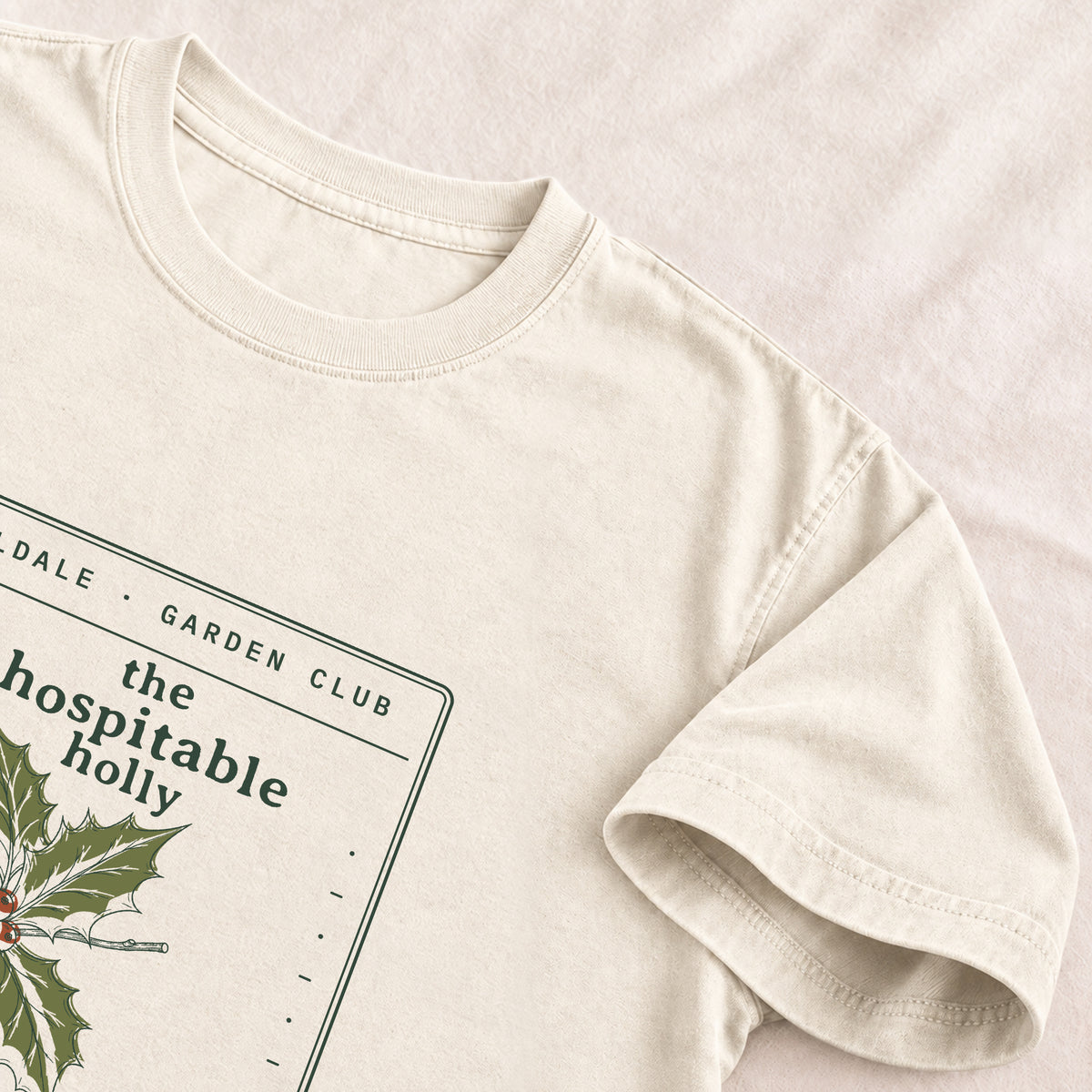 The Hospitable Holly tee in Ivory, detail