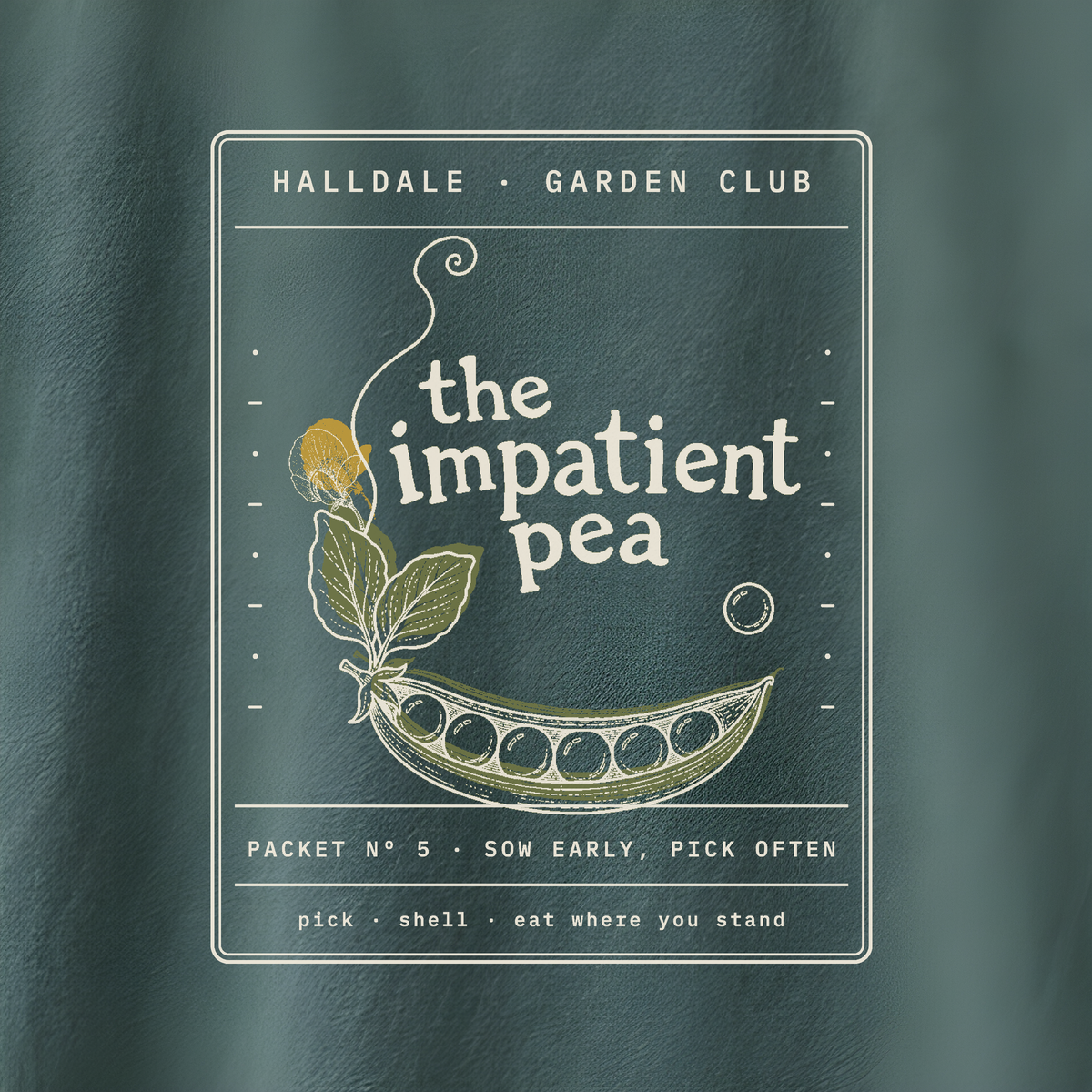 The Impatient Pea tee in Blue Spruce, close-up of the print