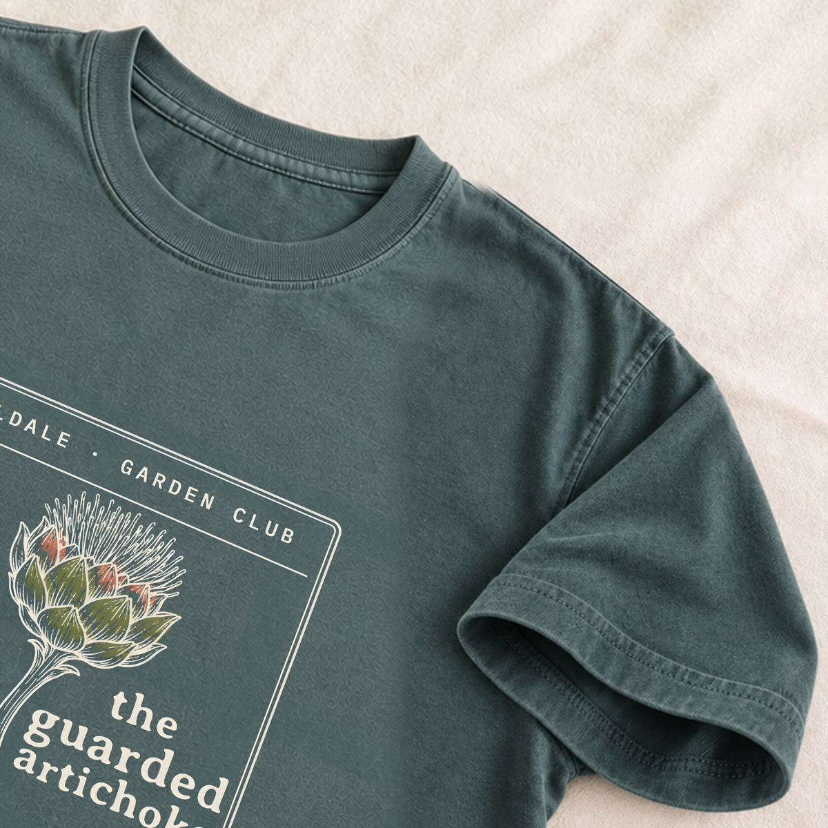 The Guarded Artichoke tee in Blue Spruce, detail