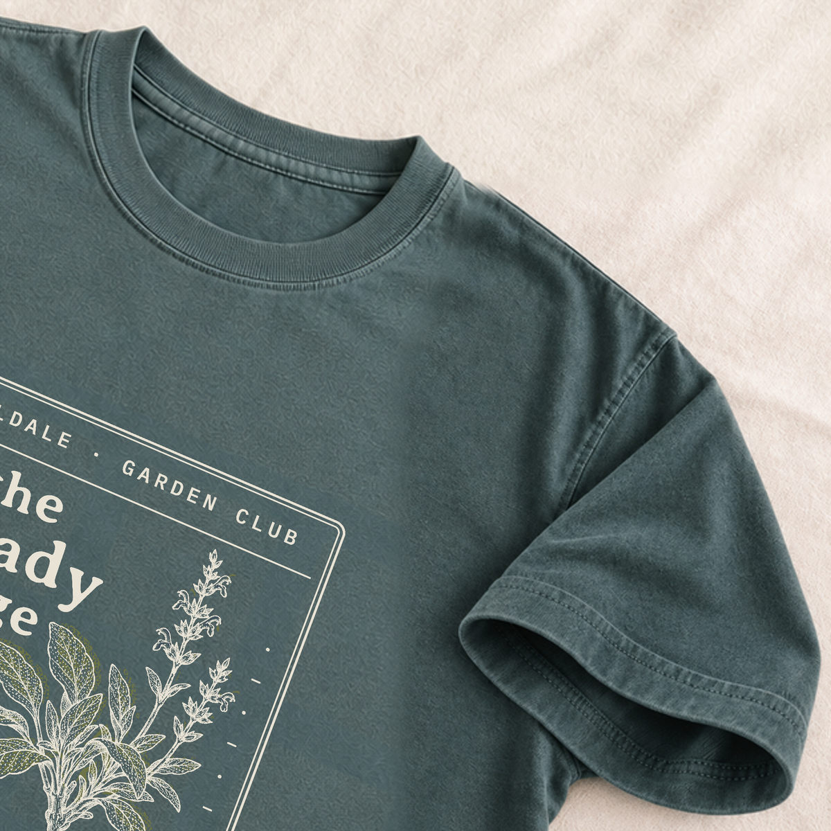 The Steady Sage tee in Blue Spruce, detail