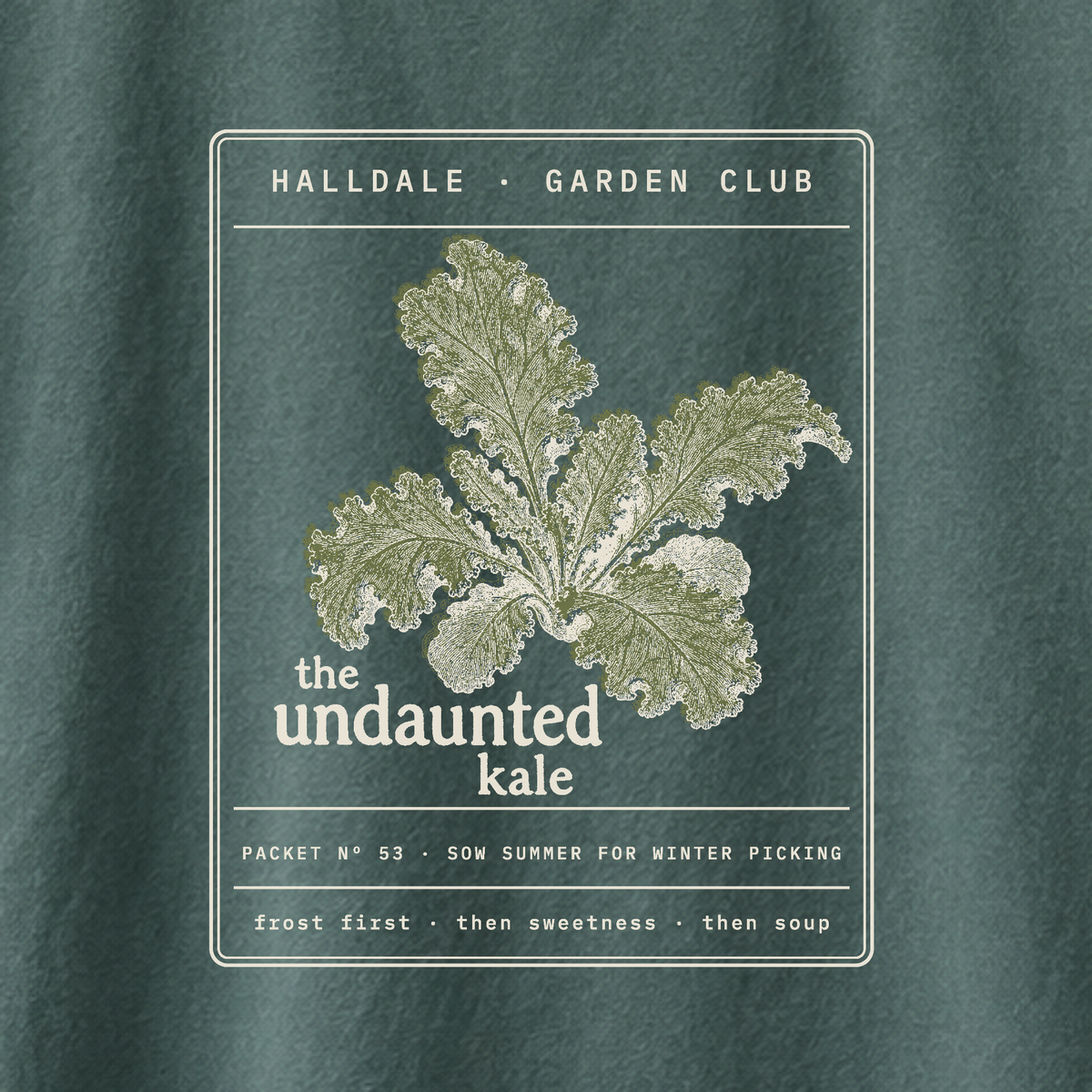 The Undaunted Kale tee in Blue Spruce, close-up of the print