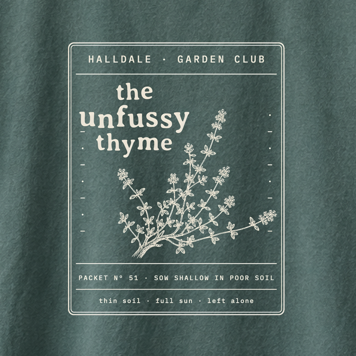 The Unfussy Thyme tee in Blue Spruce, close-up of the print