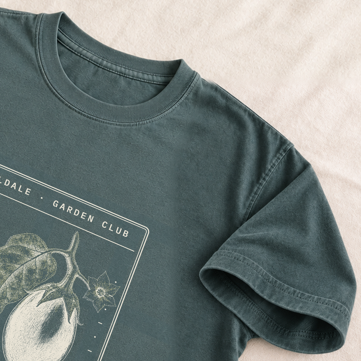 The Discerning Eggplant tee in Blue Spruce, detail