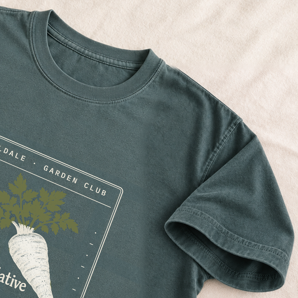 The Contemplative Parsnip tee in Blue Spruce, detail