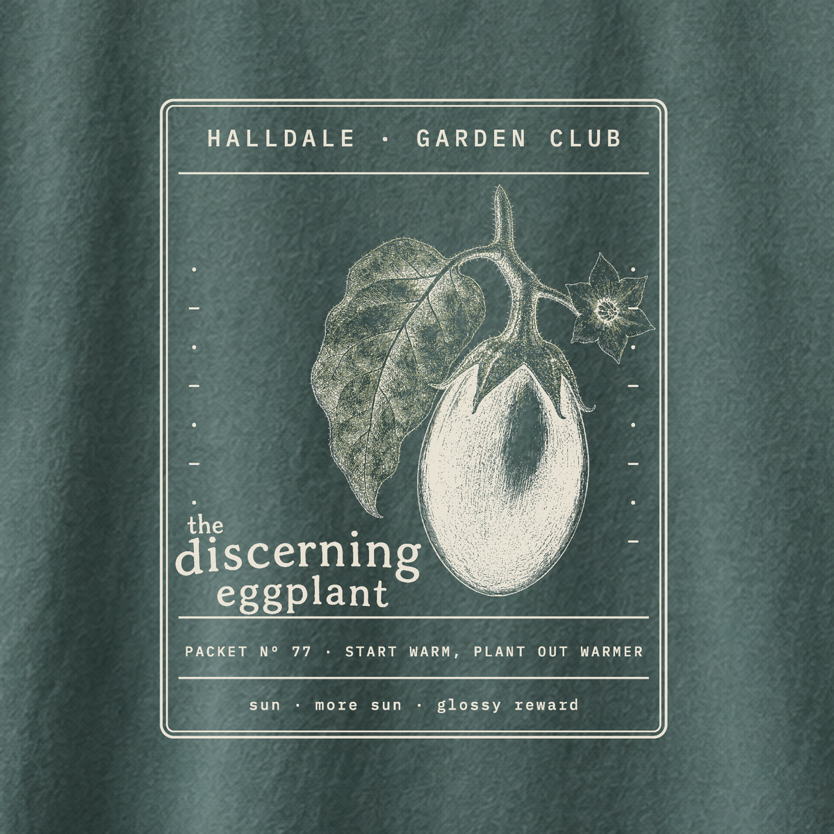 The Discerning Eggplant tee in Blue Spruce, close-up of the print