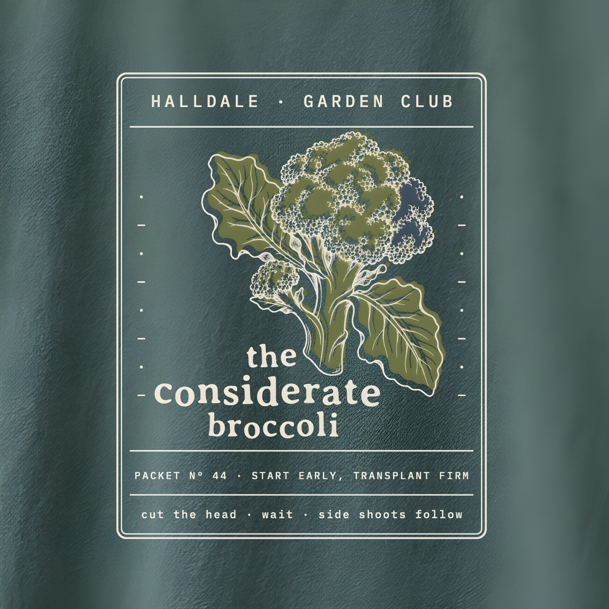 The Considerate Broccoli tee in Blue Spruce, close-up of the print