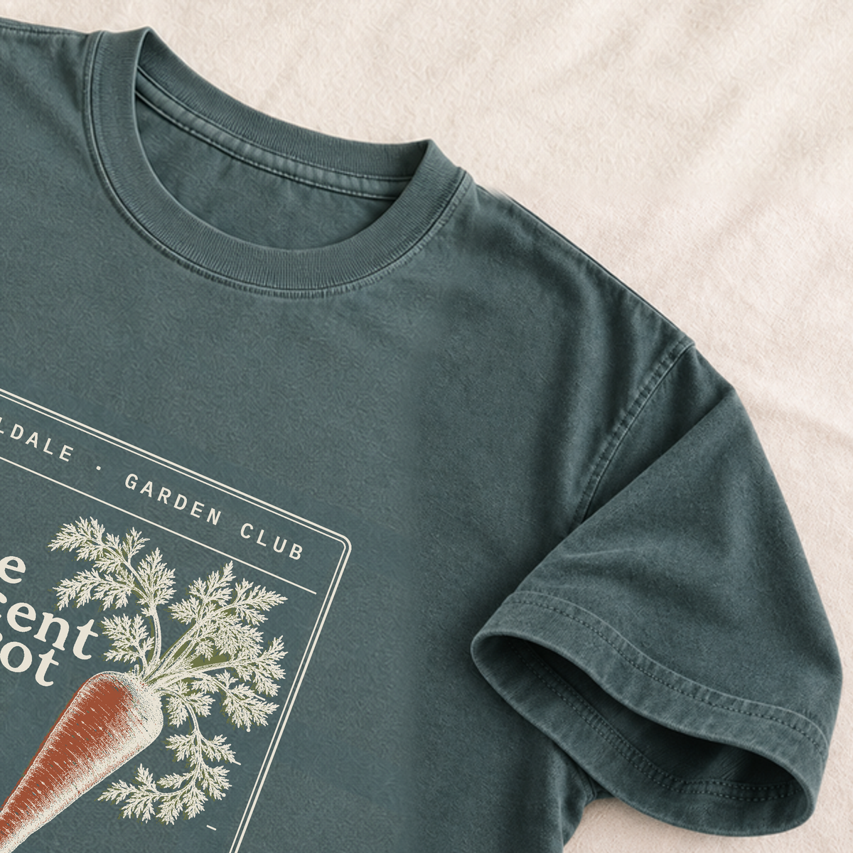 The Reticent Carrot tee in Blue Spruce, detail