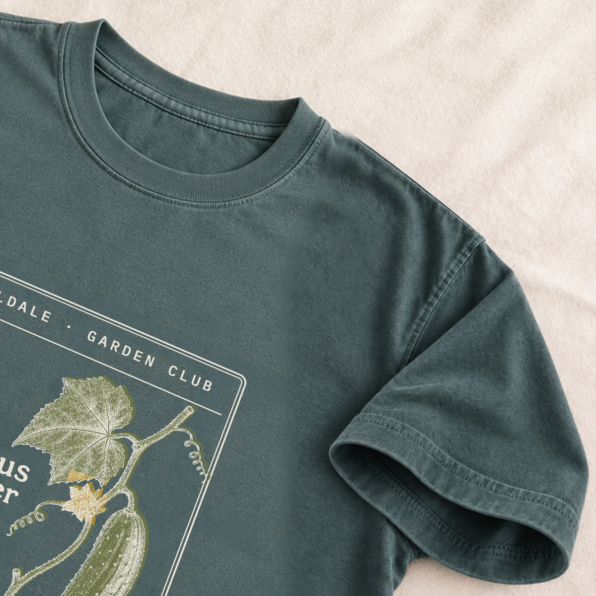 The Ambitious Cucumber tee in Blue Spruce, detail