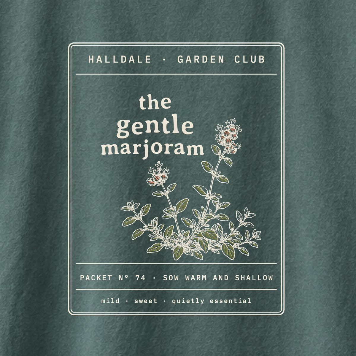 The Gentle Marjoram tee in Blue Spruce, close-up of the print