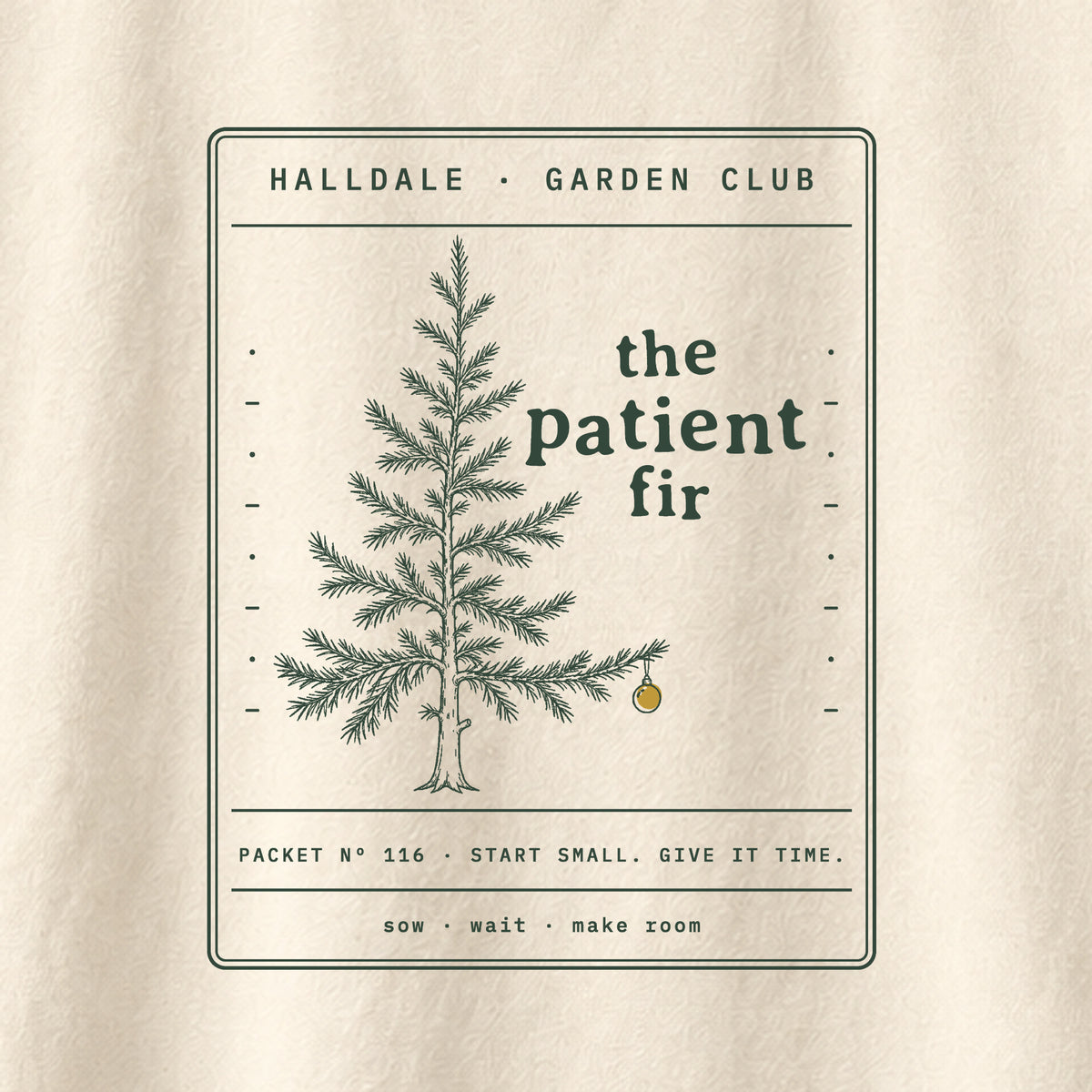 The Patient Fir tee in Ivory, close-up of the print
