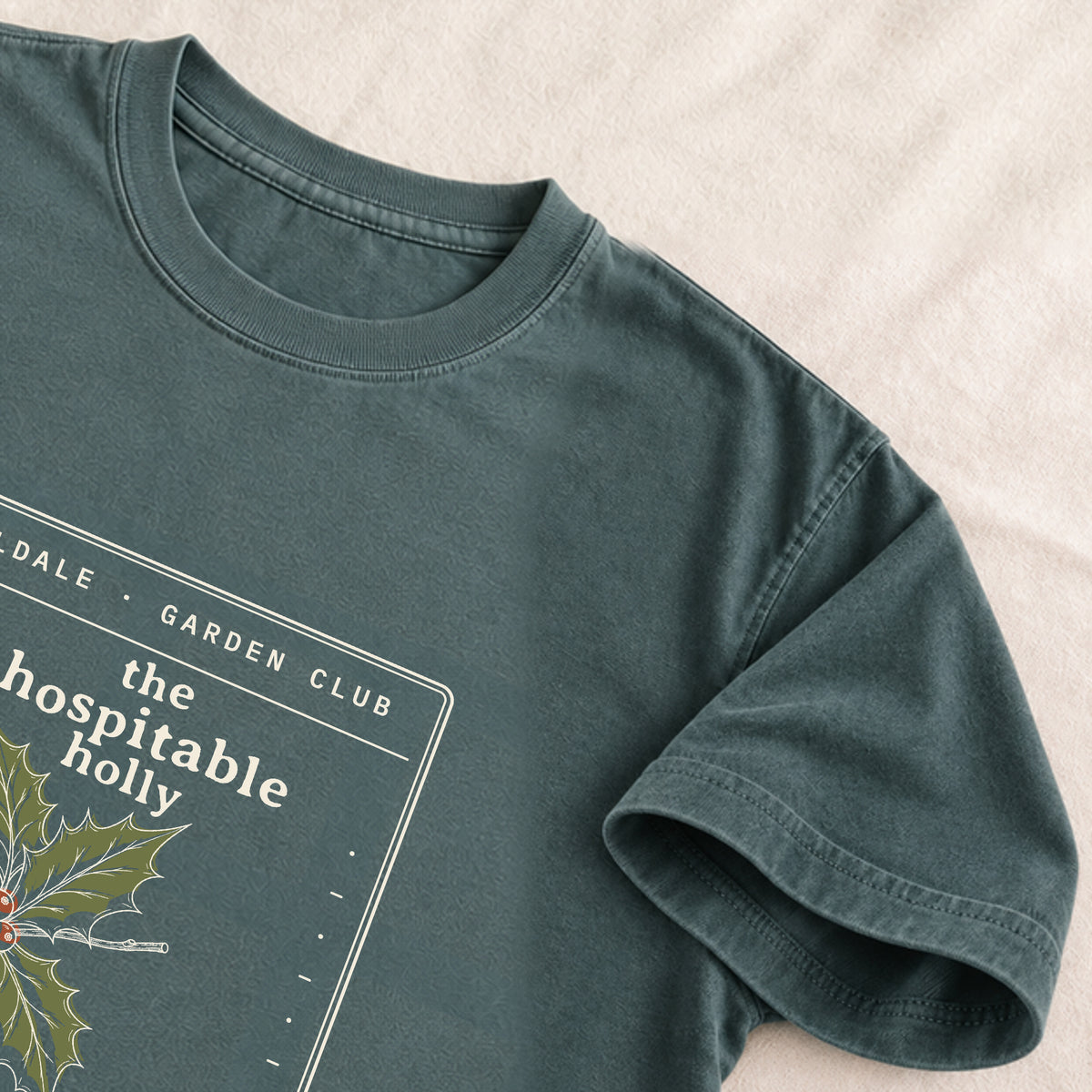 The Hospitable Holly tee in Blue Spruce, detail