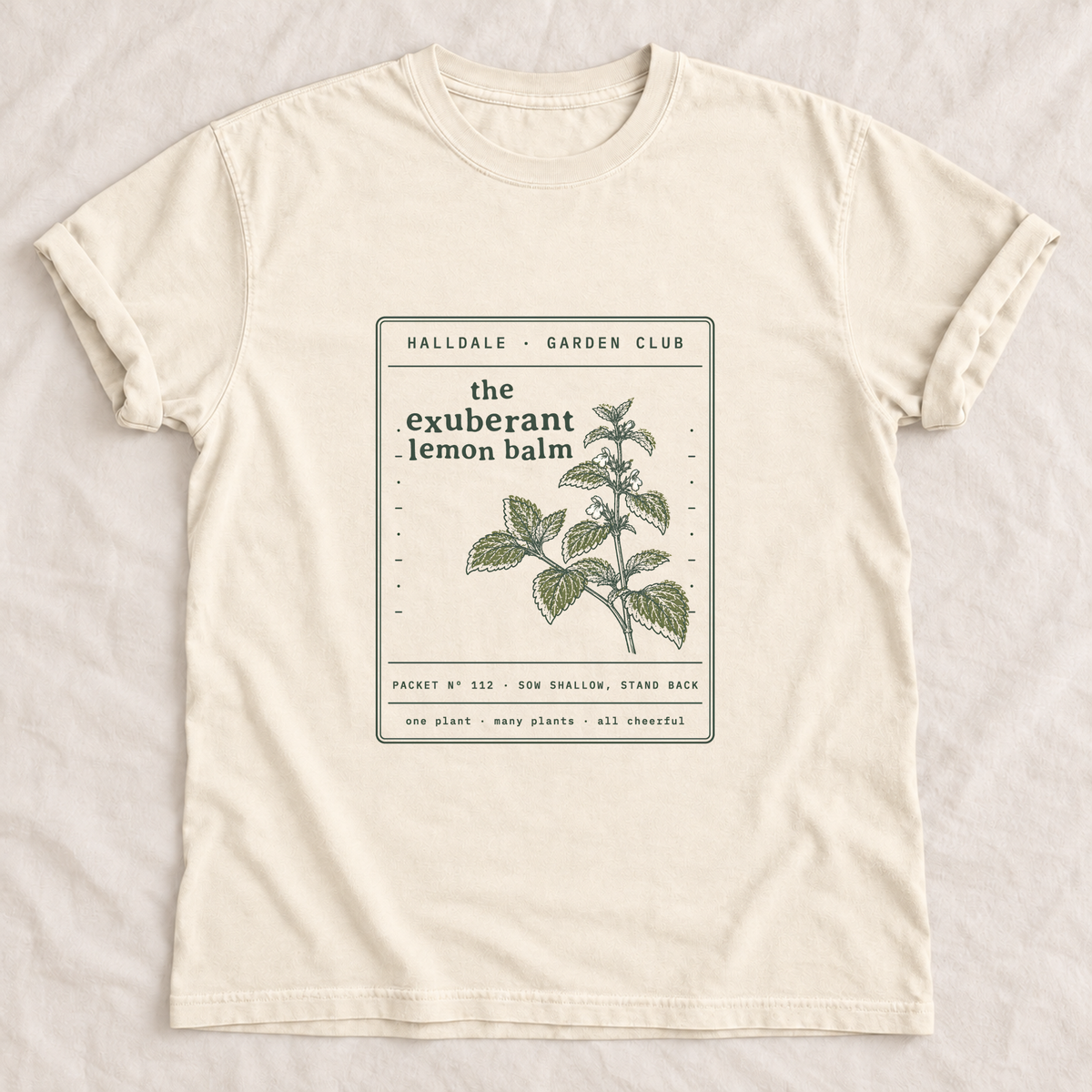 The Exuberant Lemon Balm tee in Ivory, laid flat