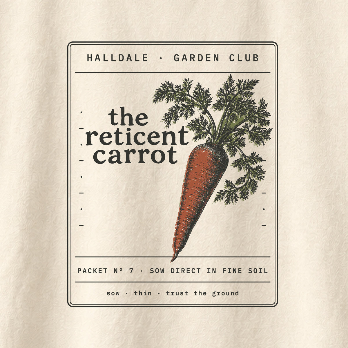 The Reticent Carrot tee in Ivory, close-up of the print
