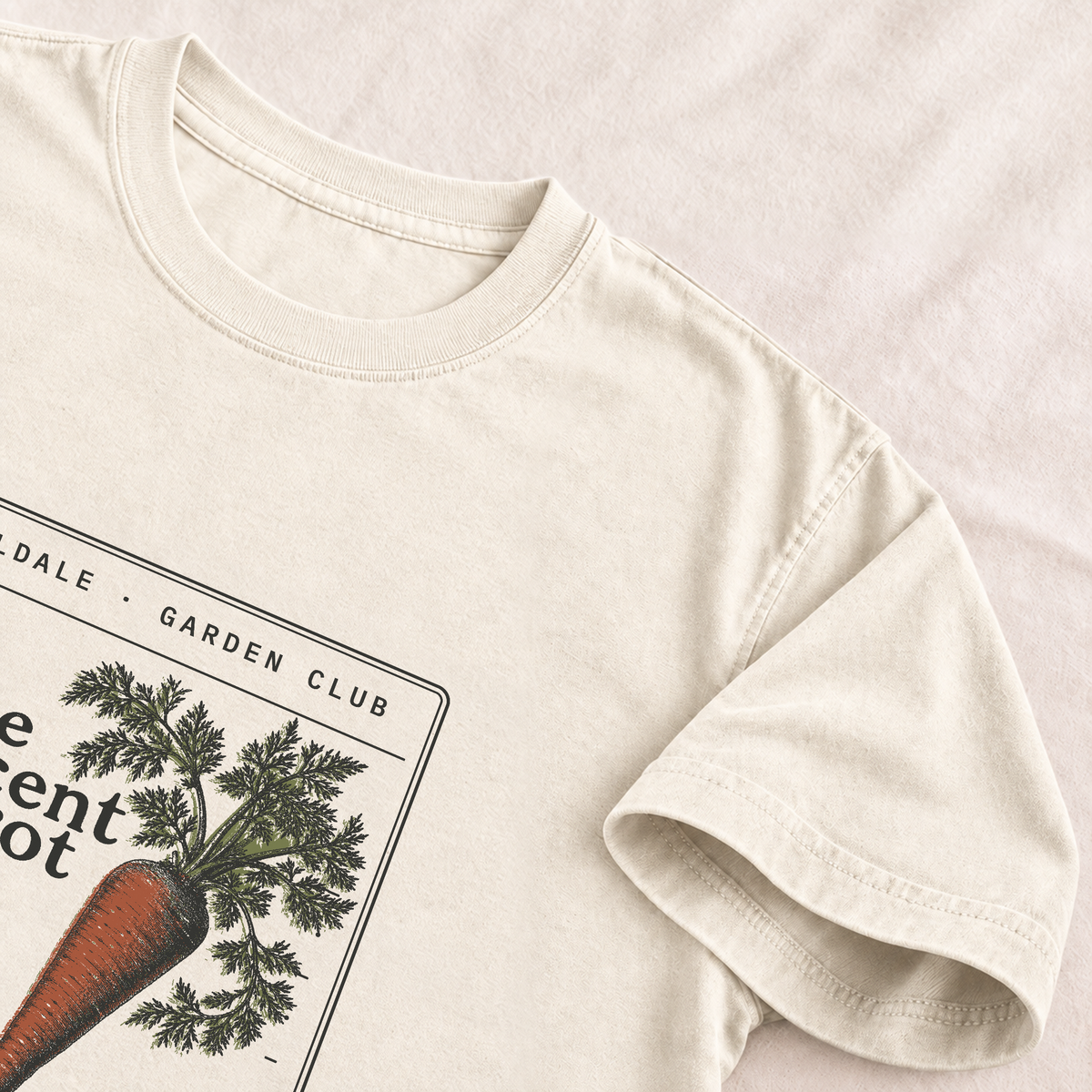The Reticent Carrot tee in Ivory, detail