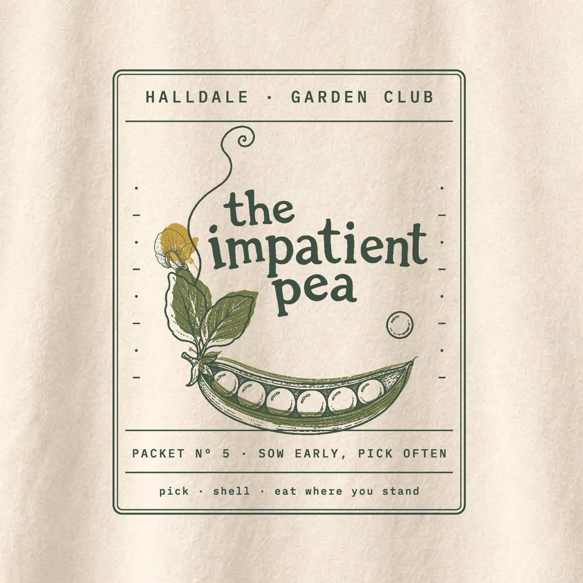 The Impatient Pea tee in Ivory, close-up of the print
