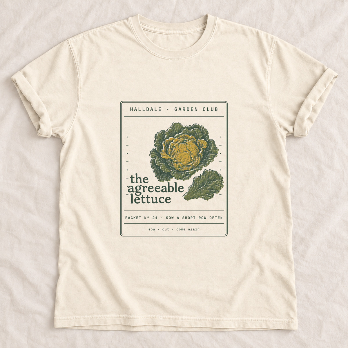 The Agreeable Lettuce tee in Ivory, laid flat