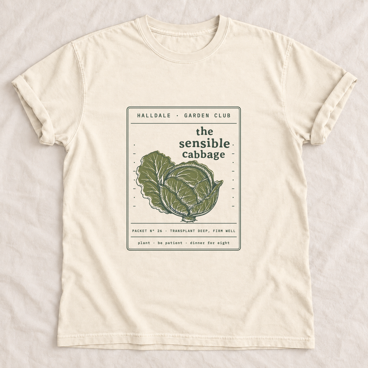 The Sensible Cabbage tee in Ivory, laid flat