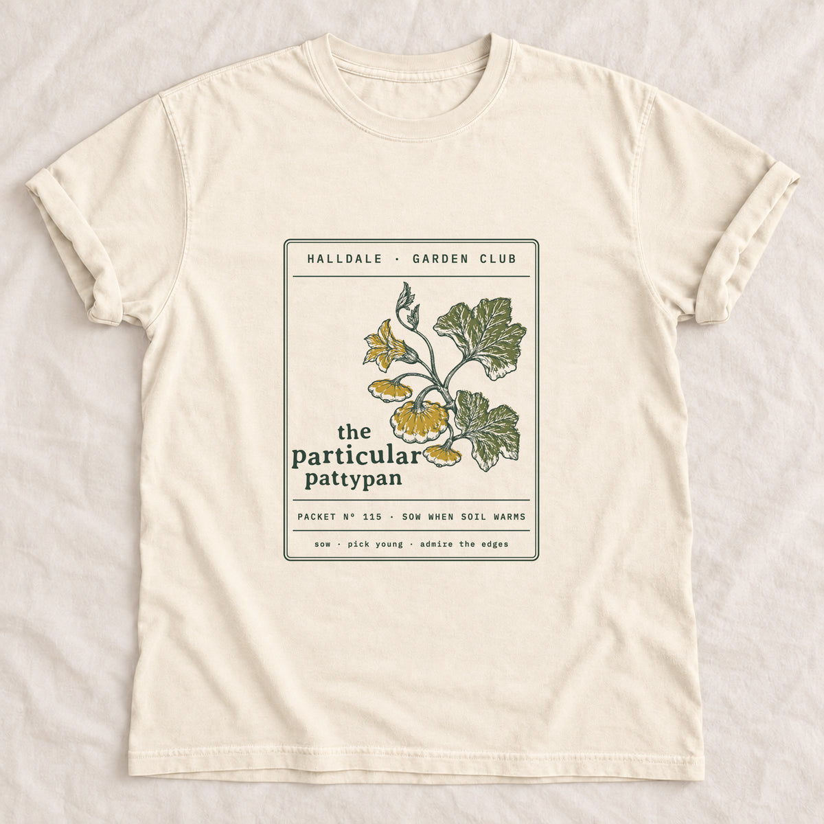 The Particular Pattypan tee in Ivory, laid flat