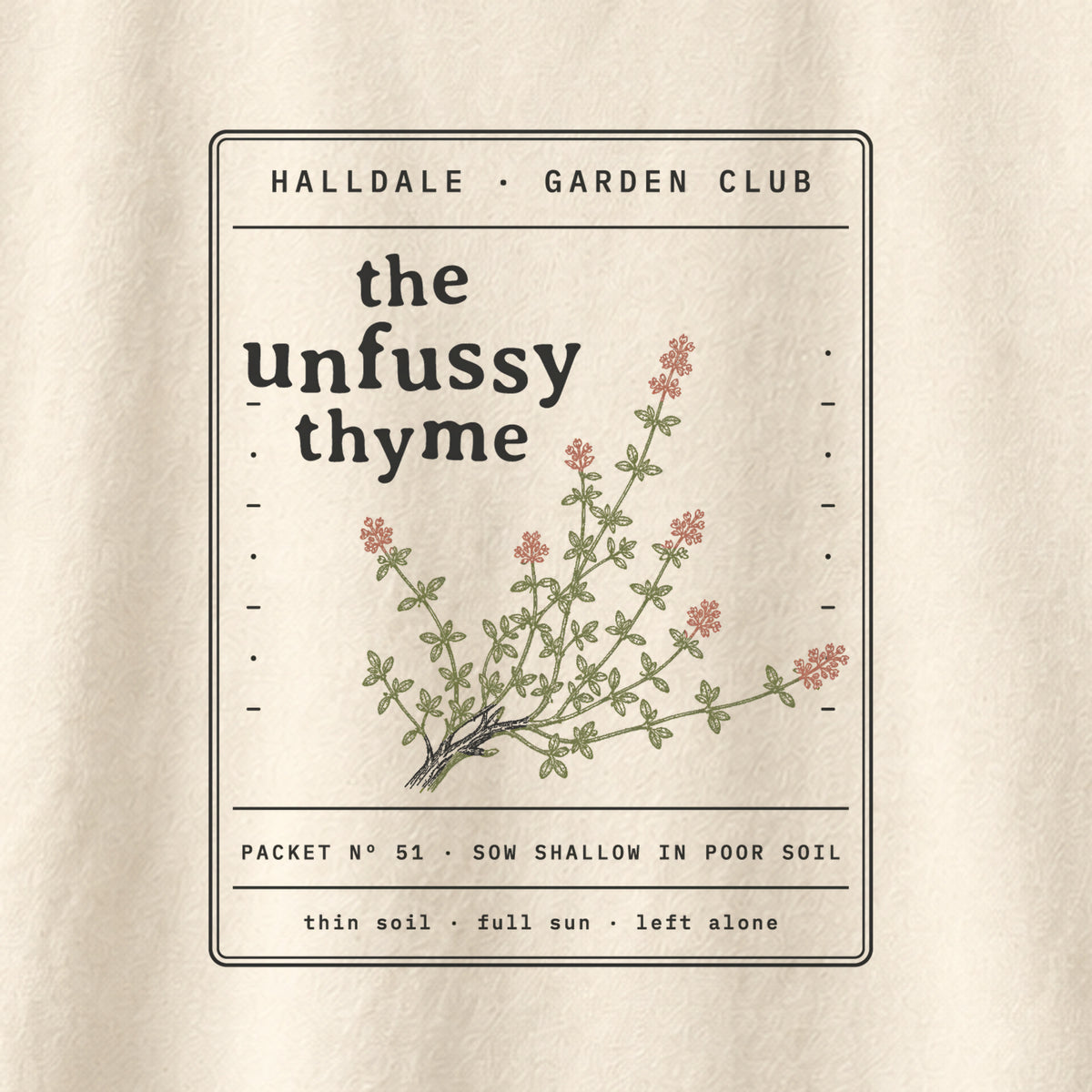 The Unfussy Thyme tee in Ivory, close-up of the print