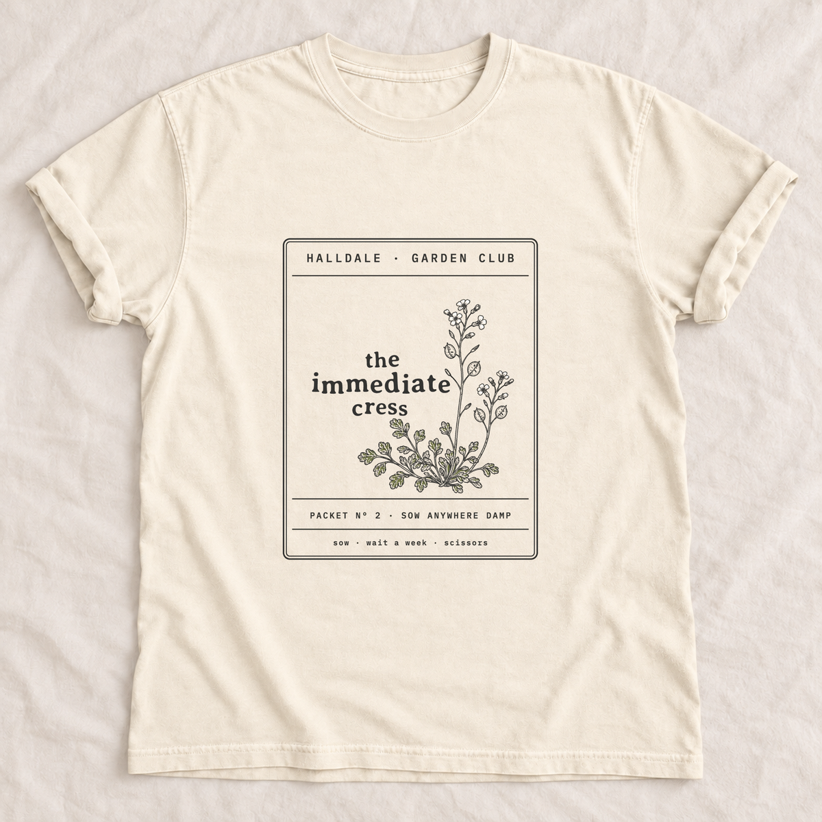 The Immediate Cress tee in Ivory, laid flat