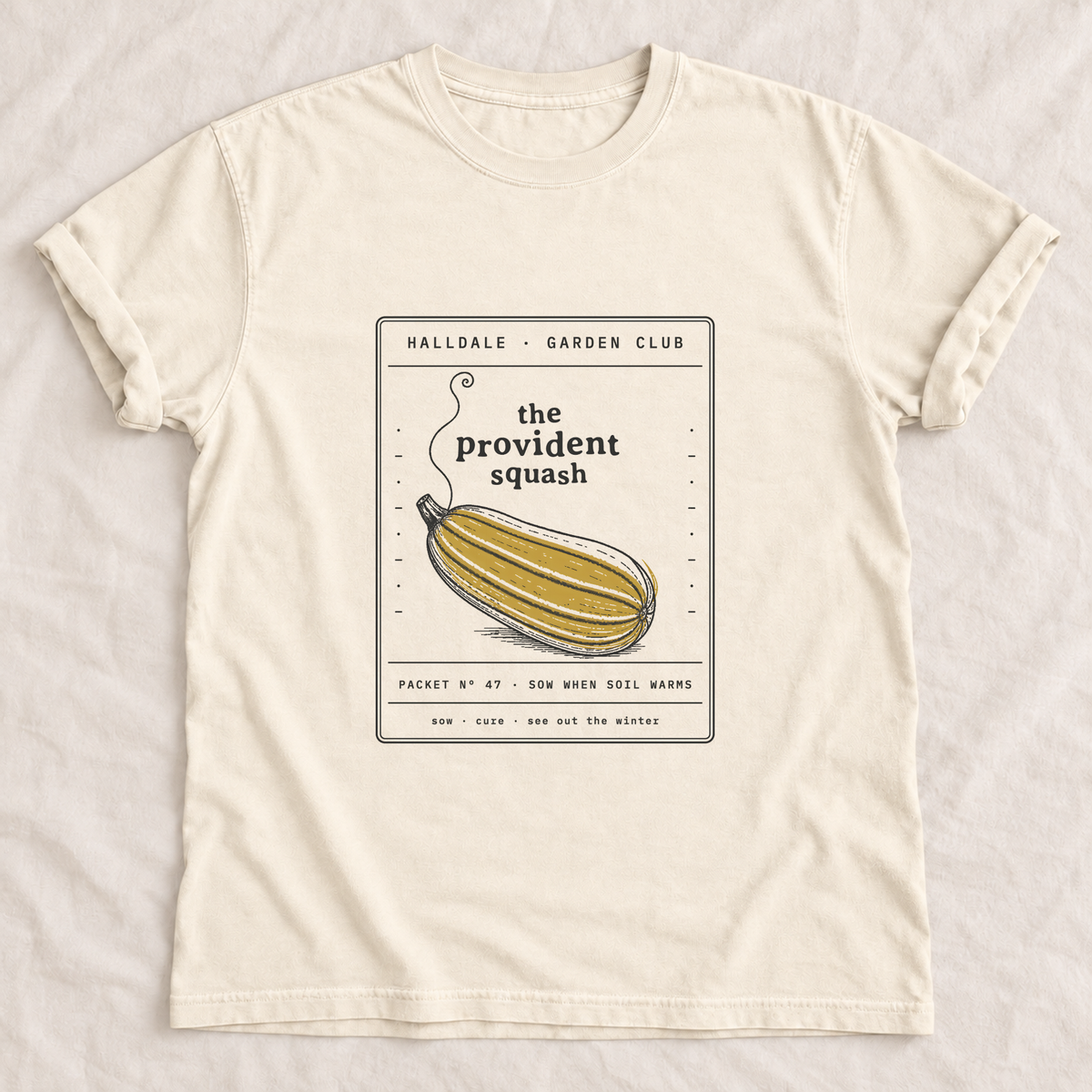 The Provident Squash tee in Ivory, laid flat