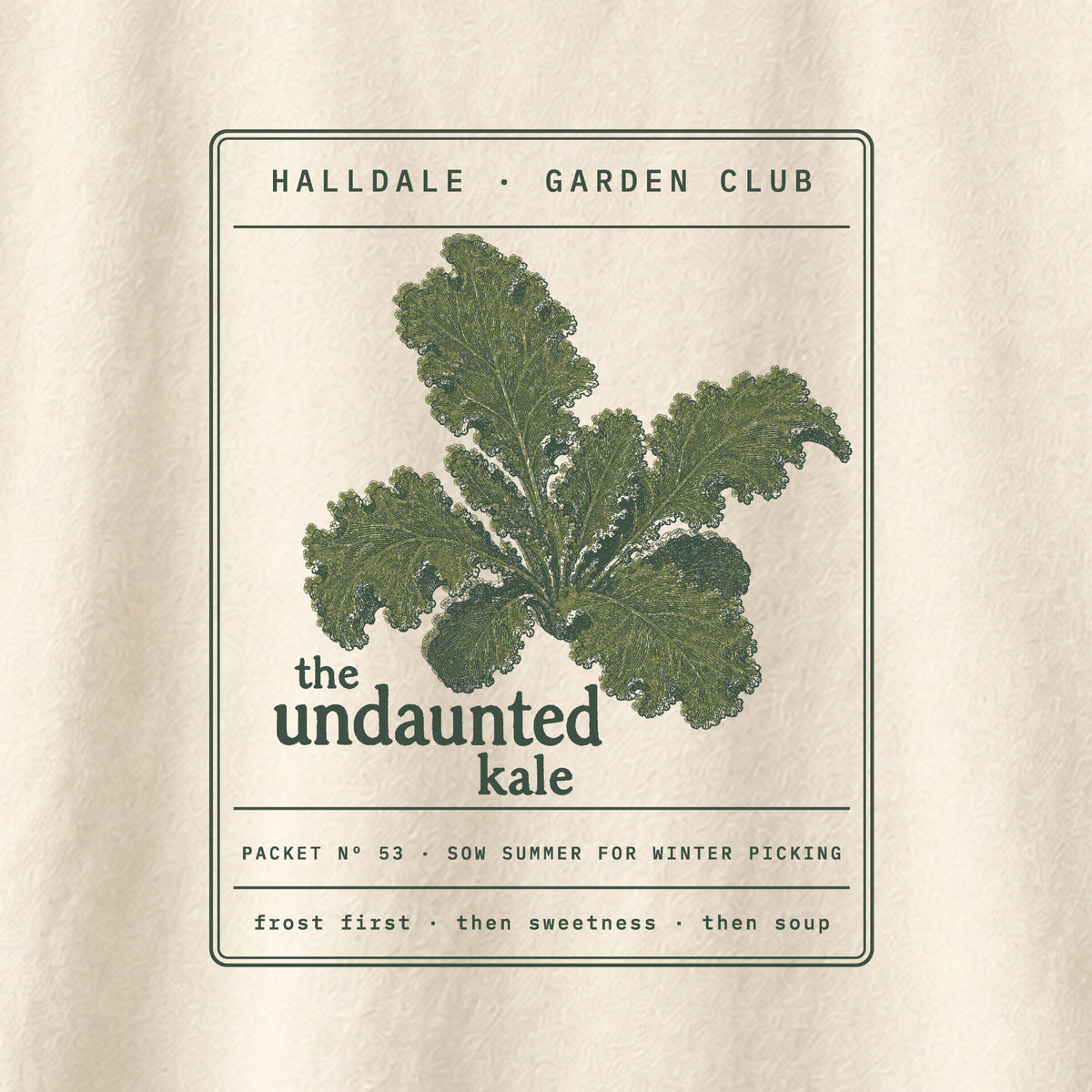 The Undaunted Kale tee in Ivory, close-up of the print