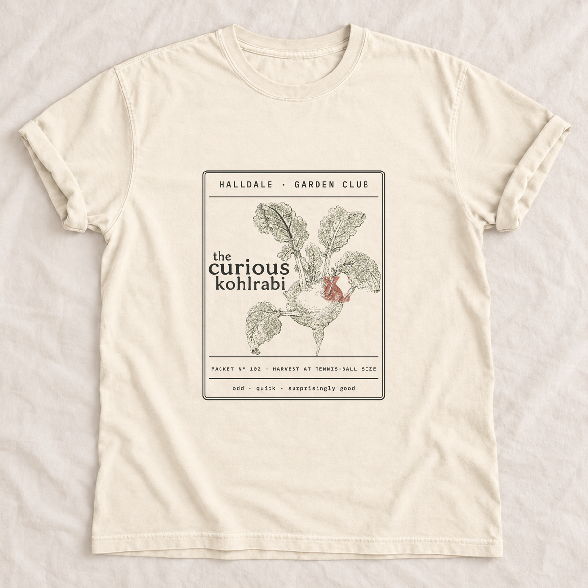 The Curious Kohlrabi tee in Ivory, laid flat