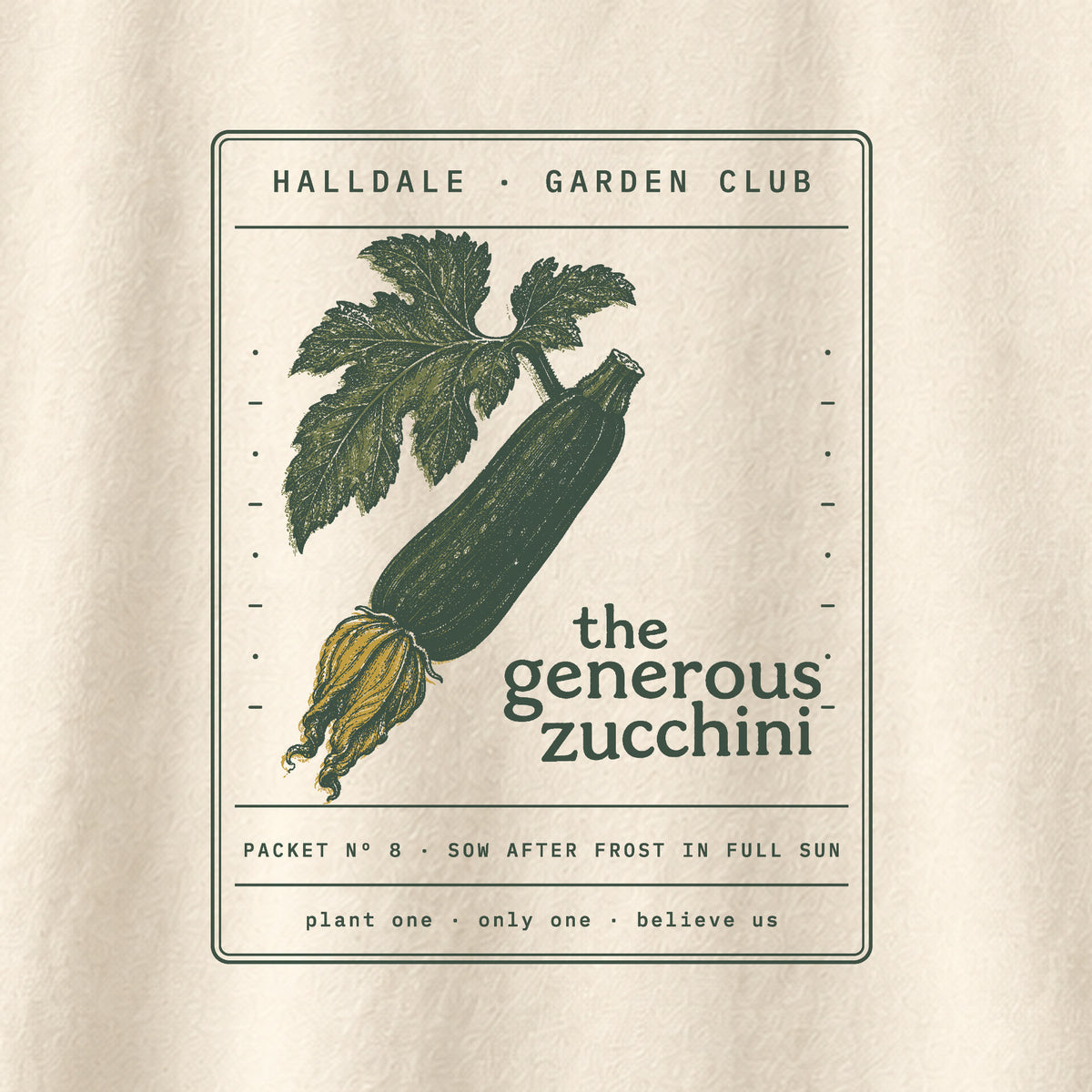 The Generous Zucchini tee in Ivory, close-up of the print