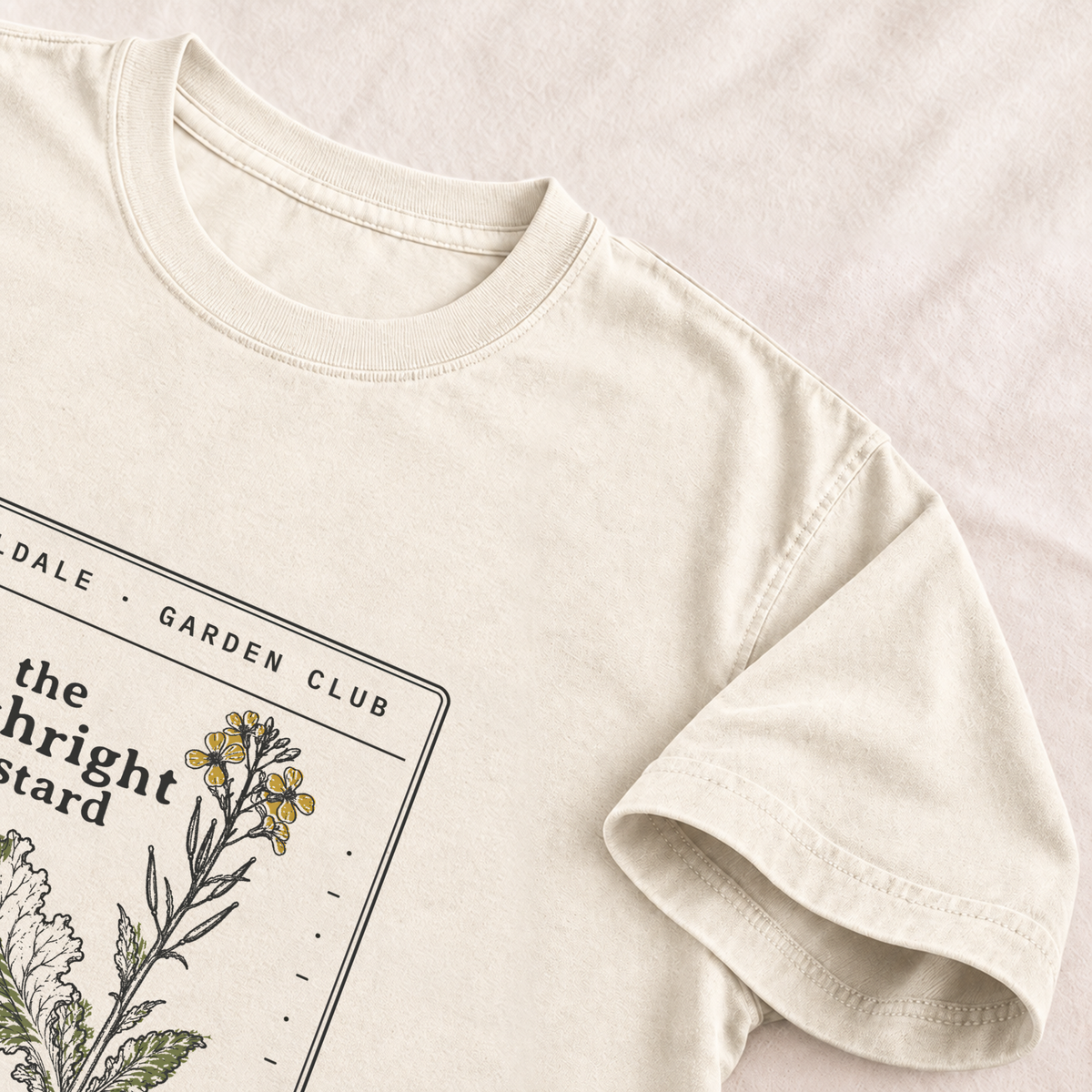 The Forthright Mustard tee in Ivory, detail