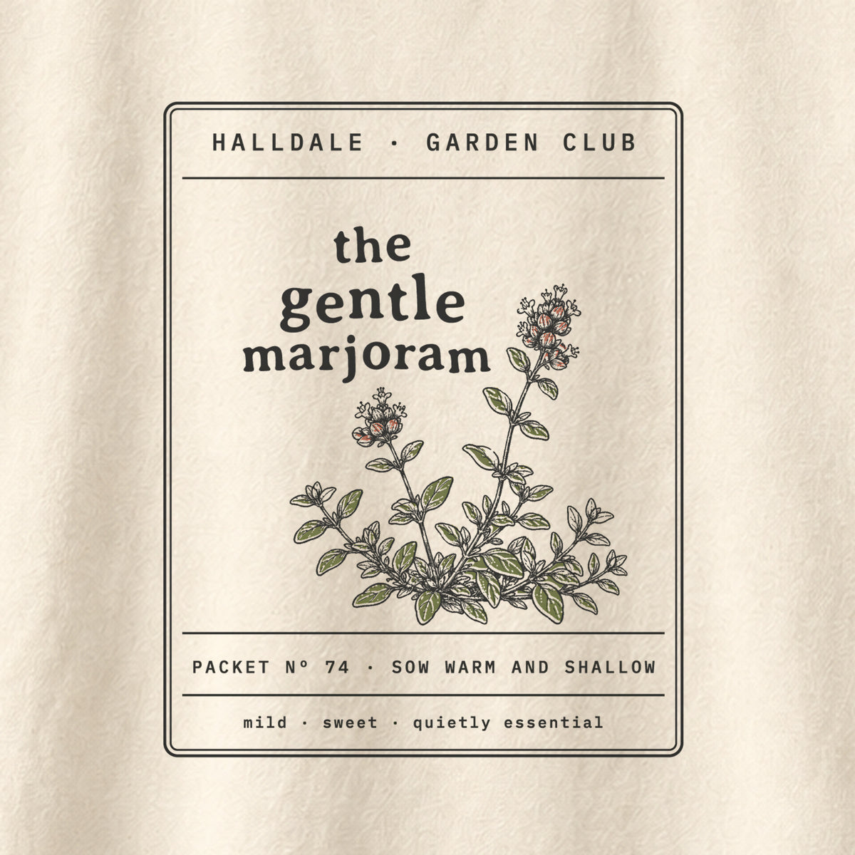 The Gentle Marjoram tee in Ivory, close-up of the print